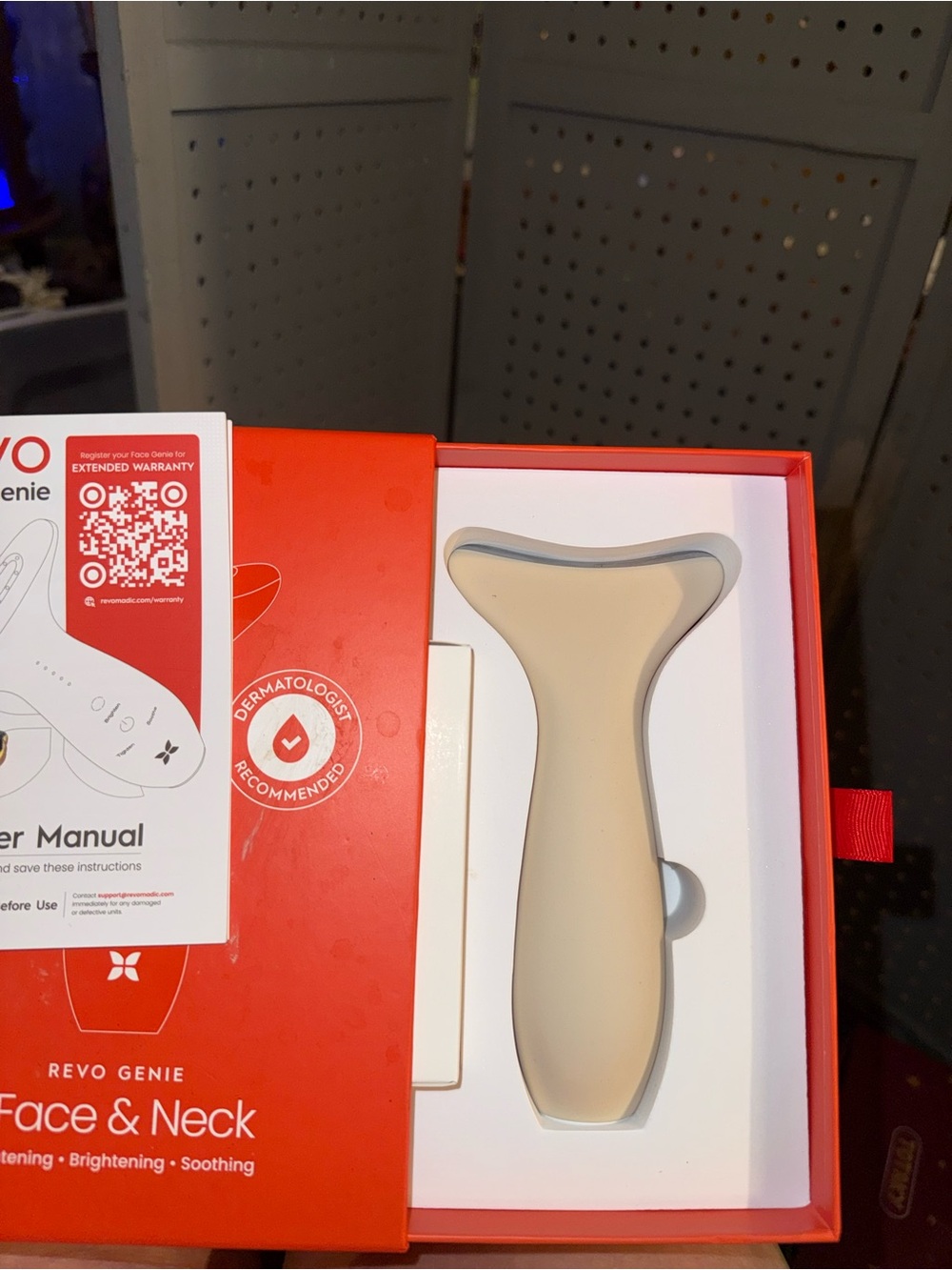 Revo Genie Face & Neck Device in Beige and White